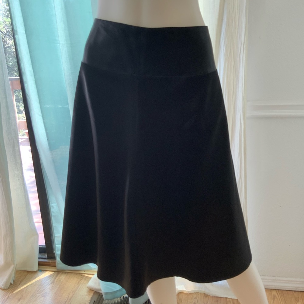 Knee length black skirt by Bay Size 12